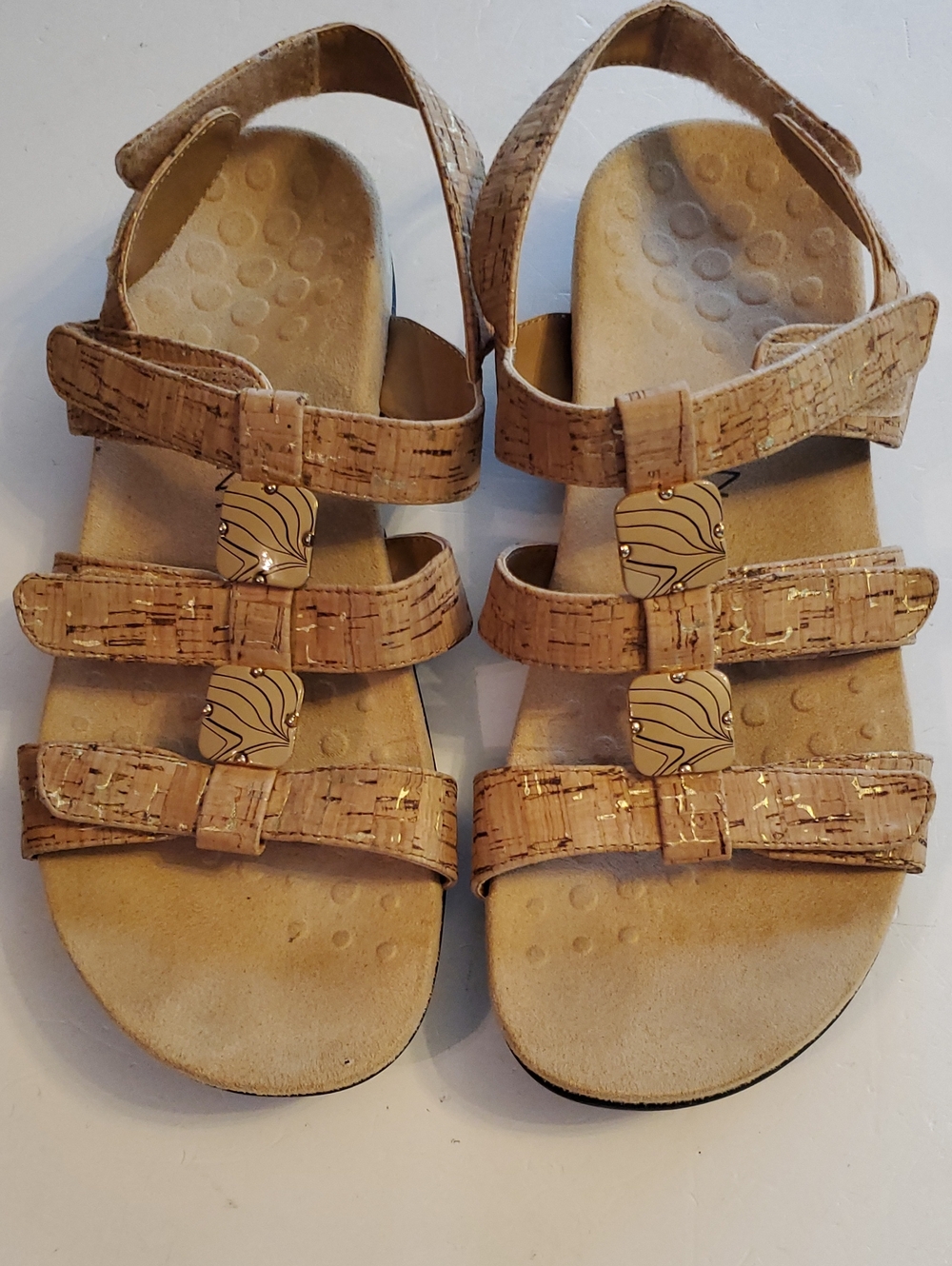Women's vionic Amber tan and gold cork print patent leather sandal flats.